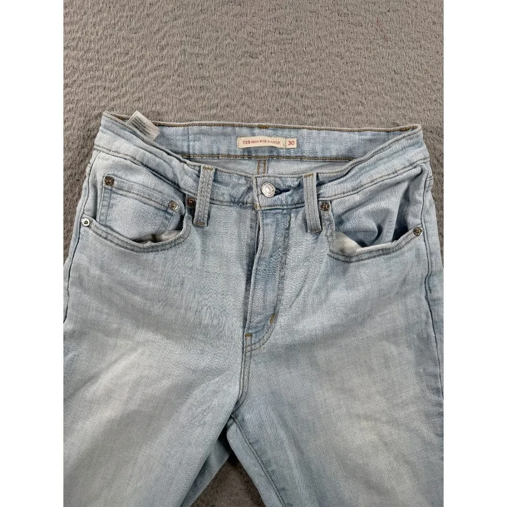 Levi's 725 High Rise Bootcut Jeans Womens 30 (26x32) Light Wash Raw Hem